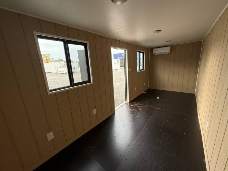 Finished office container interior with windows and mini split